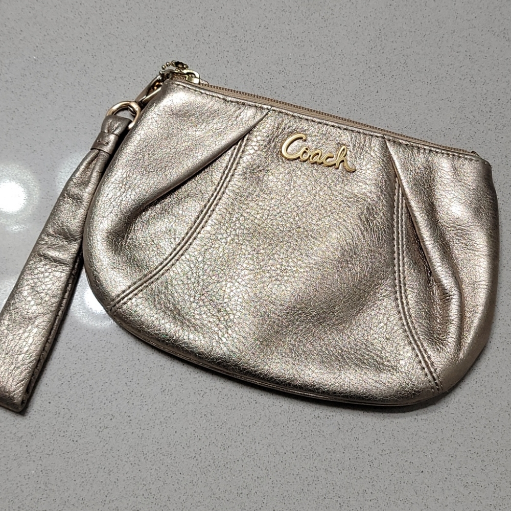 Bronze coach wristlet
